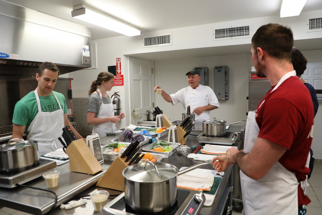 students being instructed in kitchen 