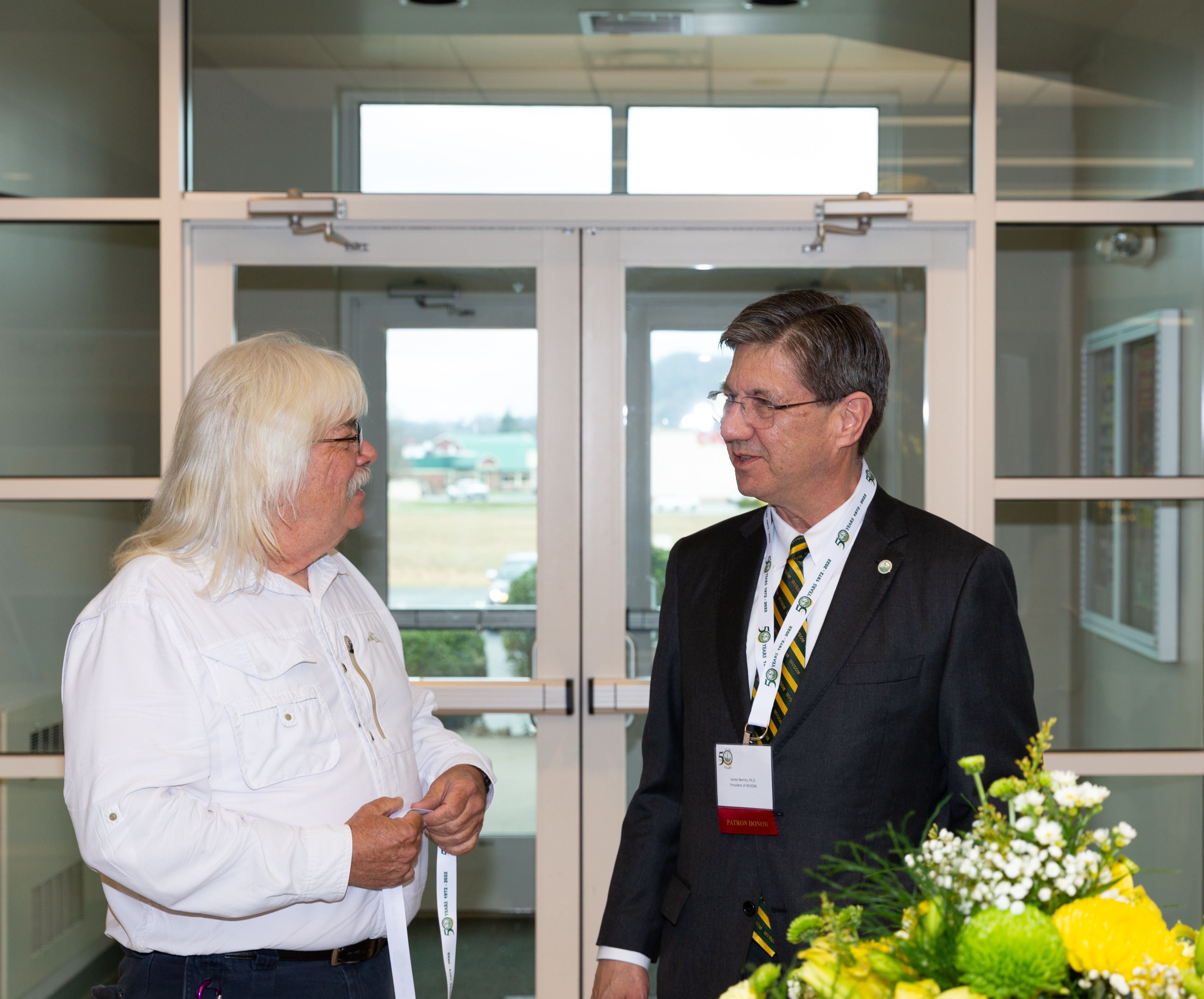 Guests and Dr. Nemitz entering event