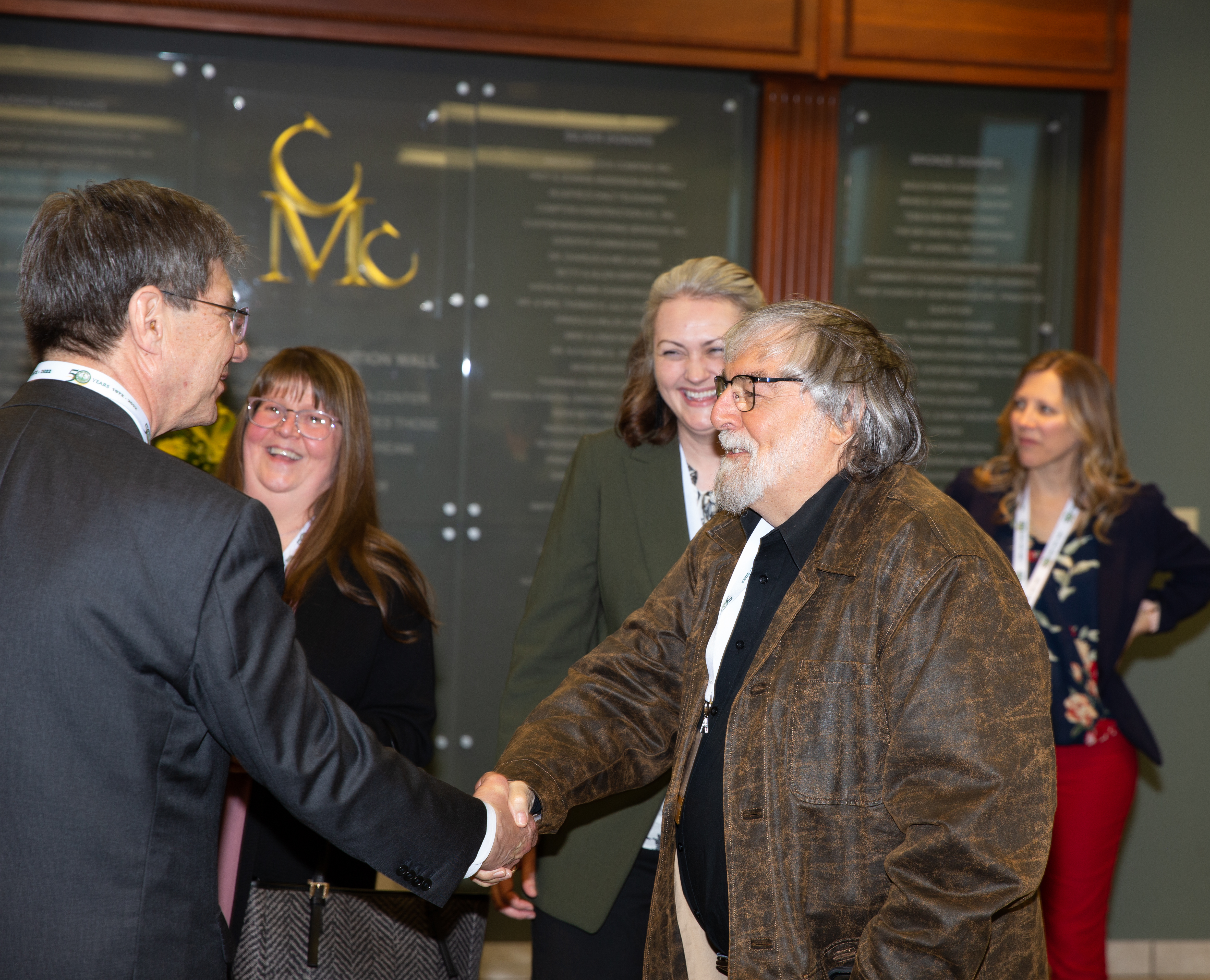 Dr. Nemitz president shaking hands