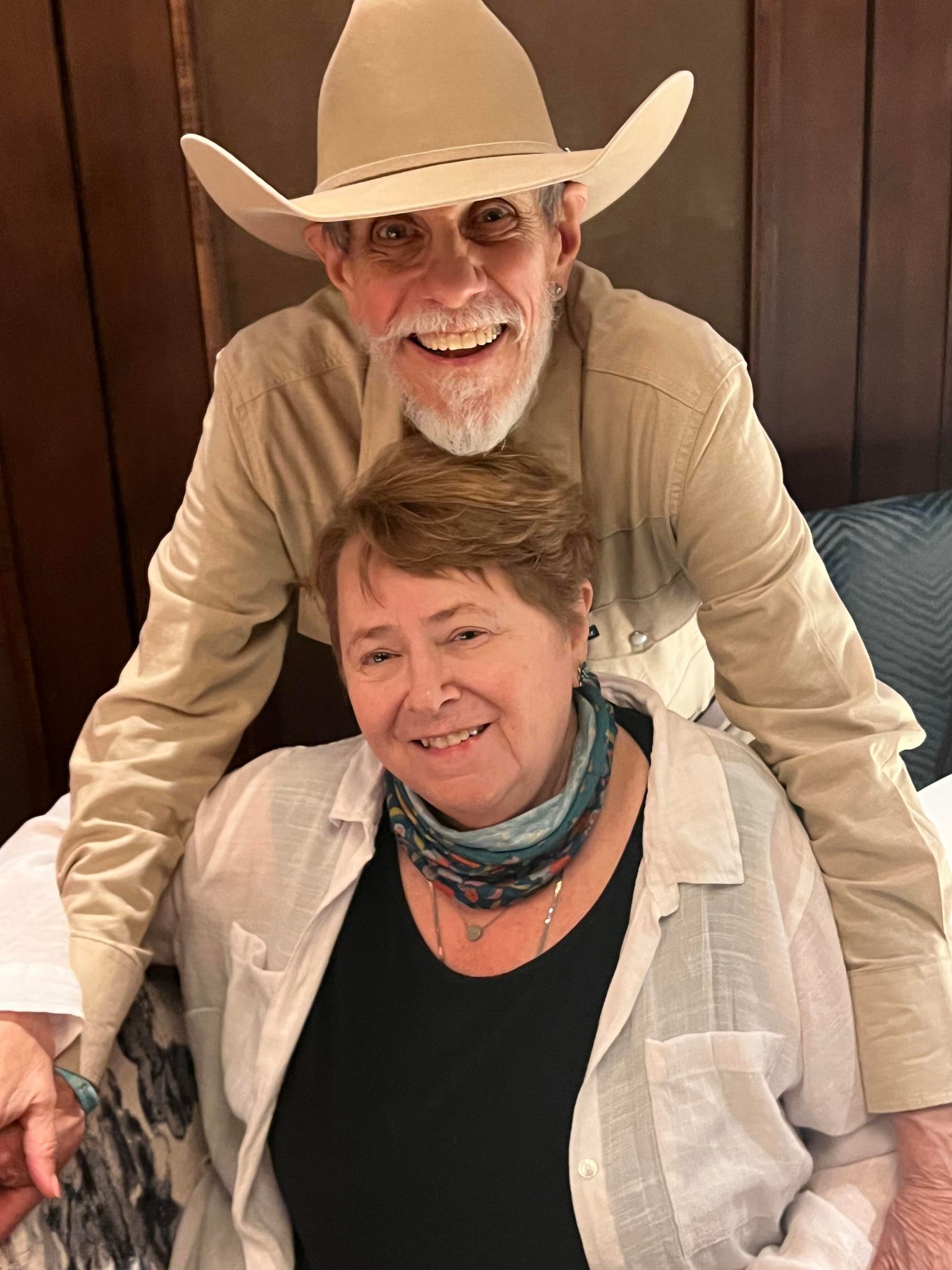 Dr. Foster and wife Mary smiling for camera at 50th alumni event.