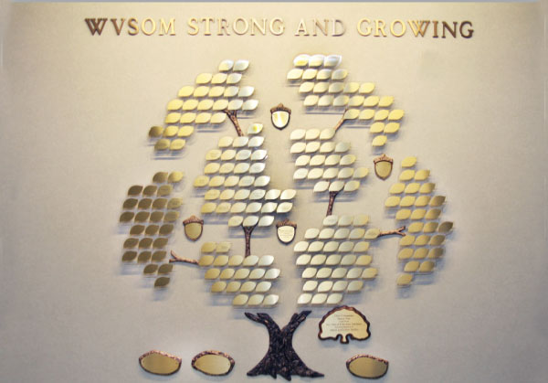 Tree with gold leaves engraved with donor names