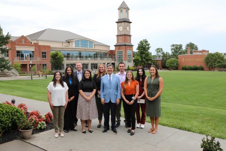 Nine WVSOM students stand with the school’s president, James W. Nemitz, Ph.D.