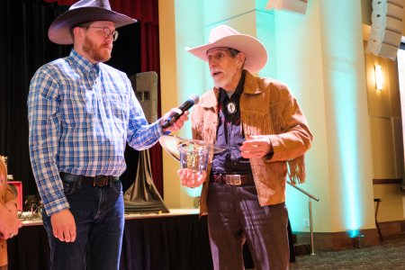 Rich Sutphin presents an award to Bob Foster, D.O.