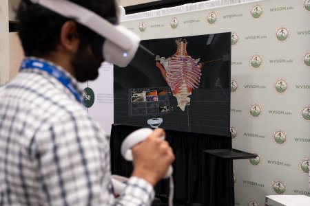 A student uses an anatomy virtual reality device