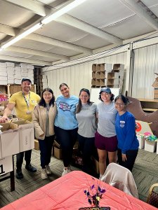 Students stand inside an area charitable organization