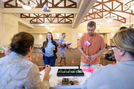 Students participate in an activity about the social determinants of health