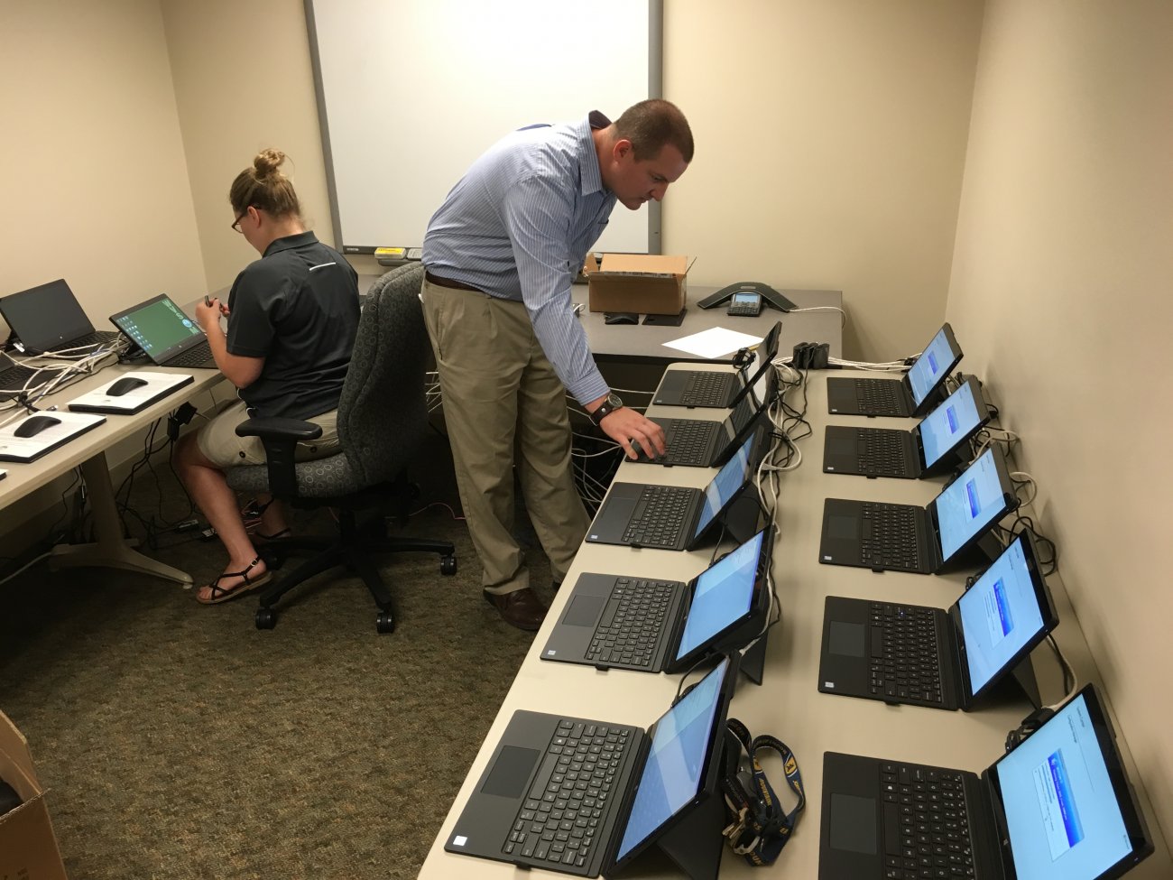 IT staff preparing computers