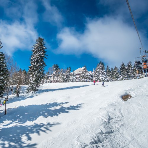 Skiers on slopes of Snowshoe Mountain