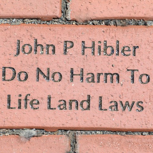 Alumni Brick inscribed with "John P Hibler Do No Harm To Life Land Laws"
